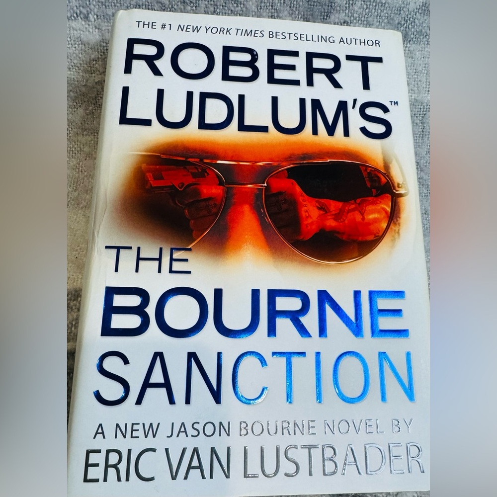Robert Ludlum’s The Bourne Sanction Hardcover Book by Eric Van Lustbader